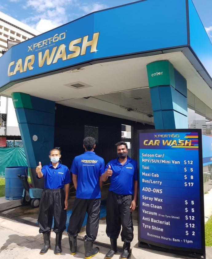 Staff at the Caltex XPERT-60 cleaning site give the thumbs up!